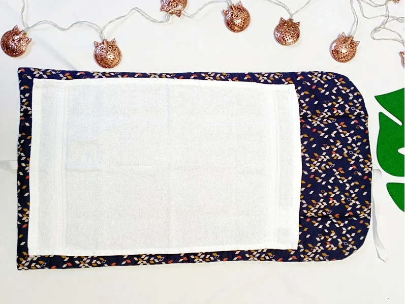 Duo matelas à langer nomade et protège carnet de santé