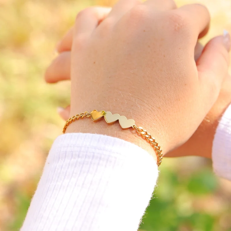 Bracelet 3 coeurs en acier PVD doré 18K