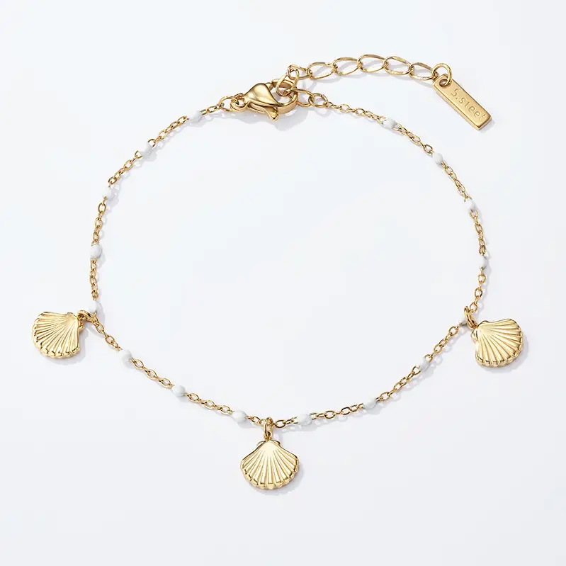 Bracelet fin en acier inoxydable pampilles coquillages
