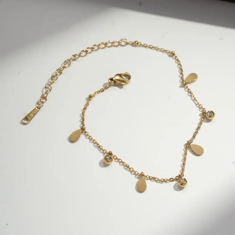 Bracelet en acier inoxydable raffiné pampilles et strass