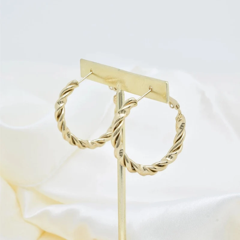 Boucles d'oreilles créoles torsade en acier