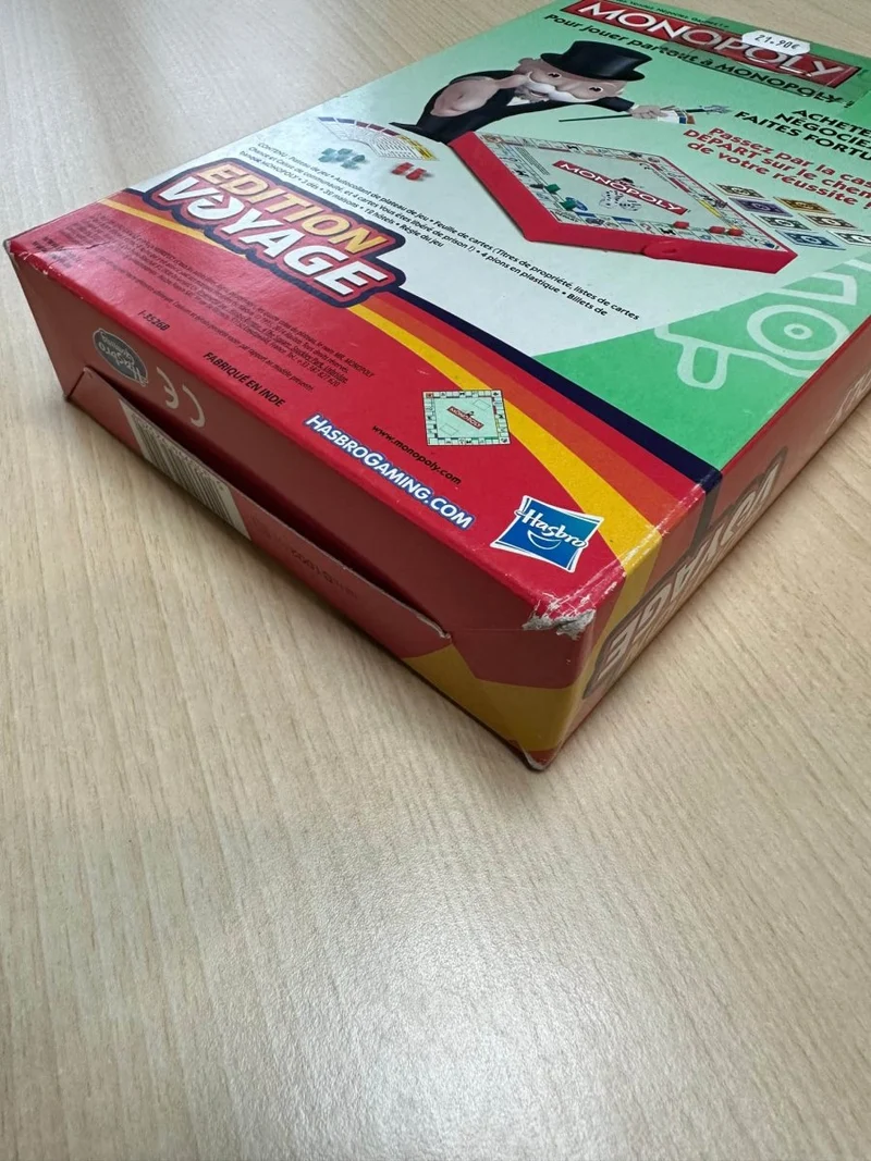Boîte abîmée - Monopoly - Edition Voyage