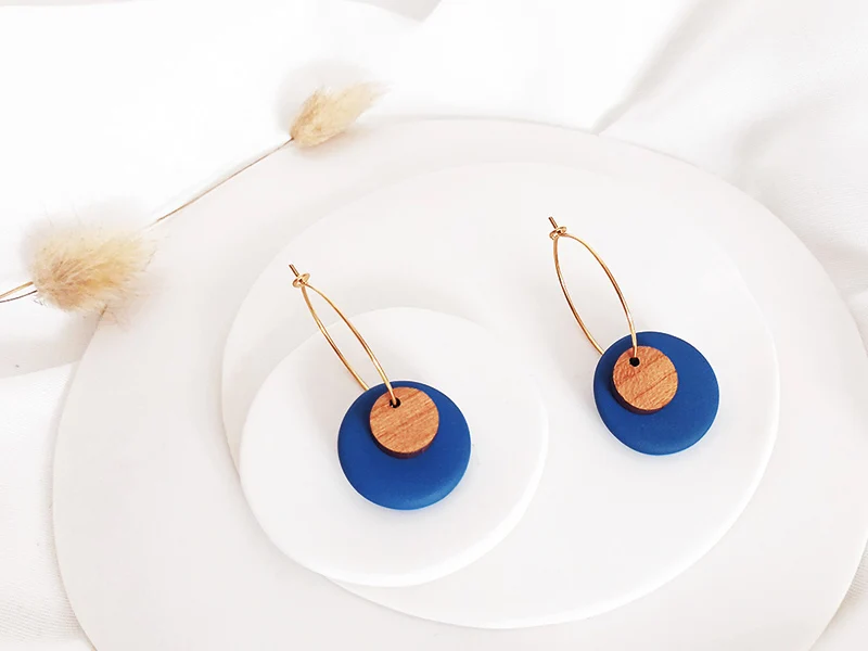 Boucle d'oreille en bois et porcelaine