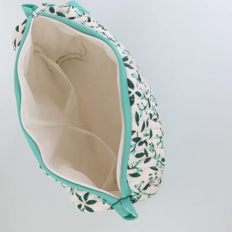 Trousse de toilette blanche et bleu motif feuilles