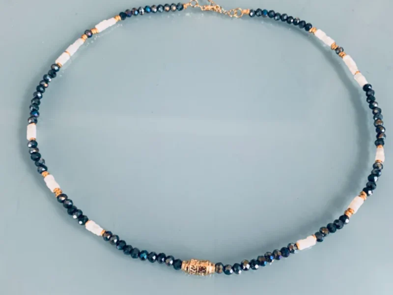 Ensemble collier, bracelet et créoles hématite